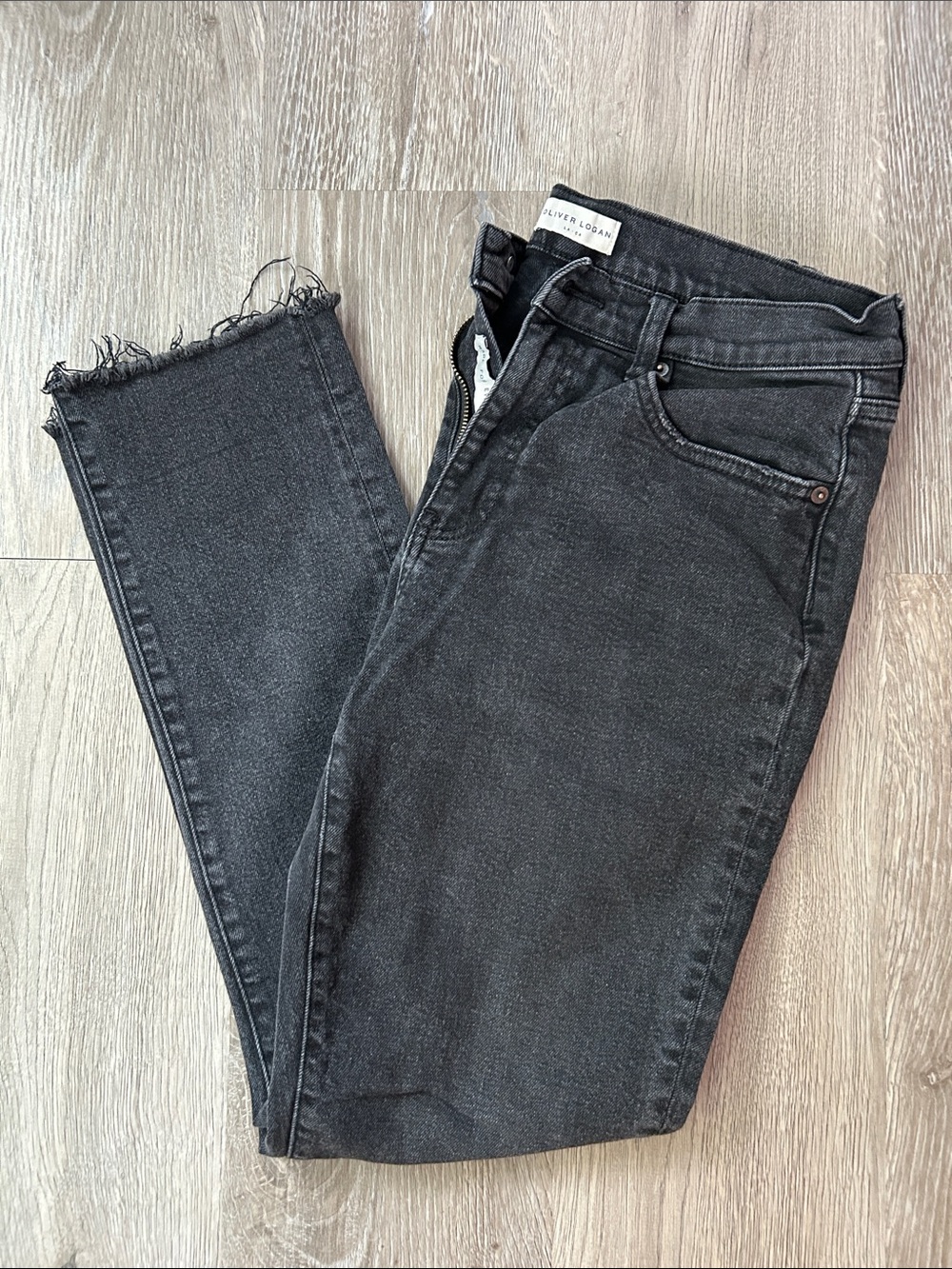 High-Rise Black Skinny Jeans with Raw Hem by Oliver Logan